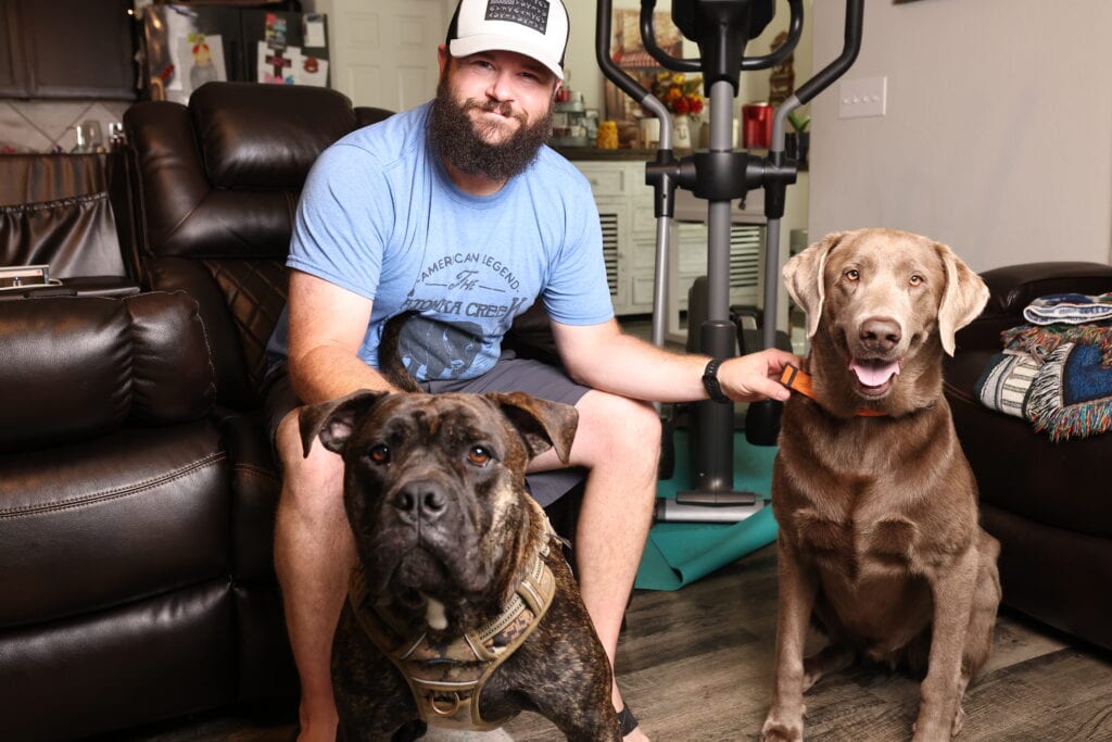 Travis and his dogs Tank and Copo