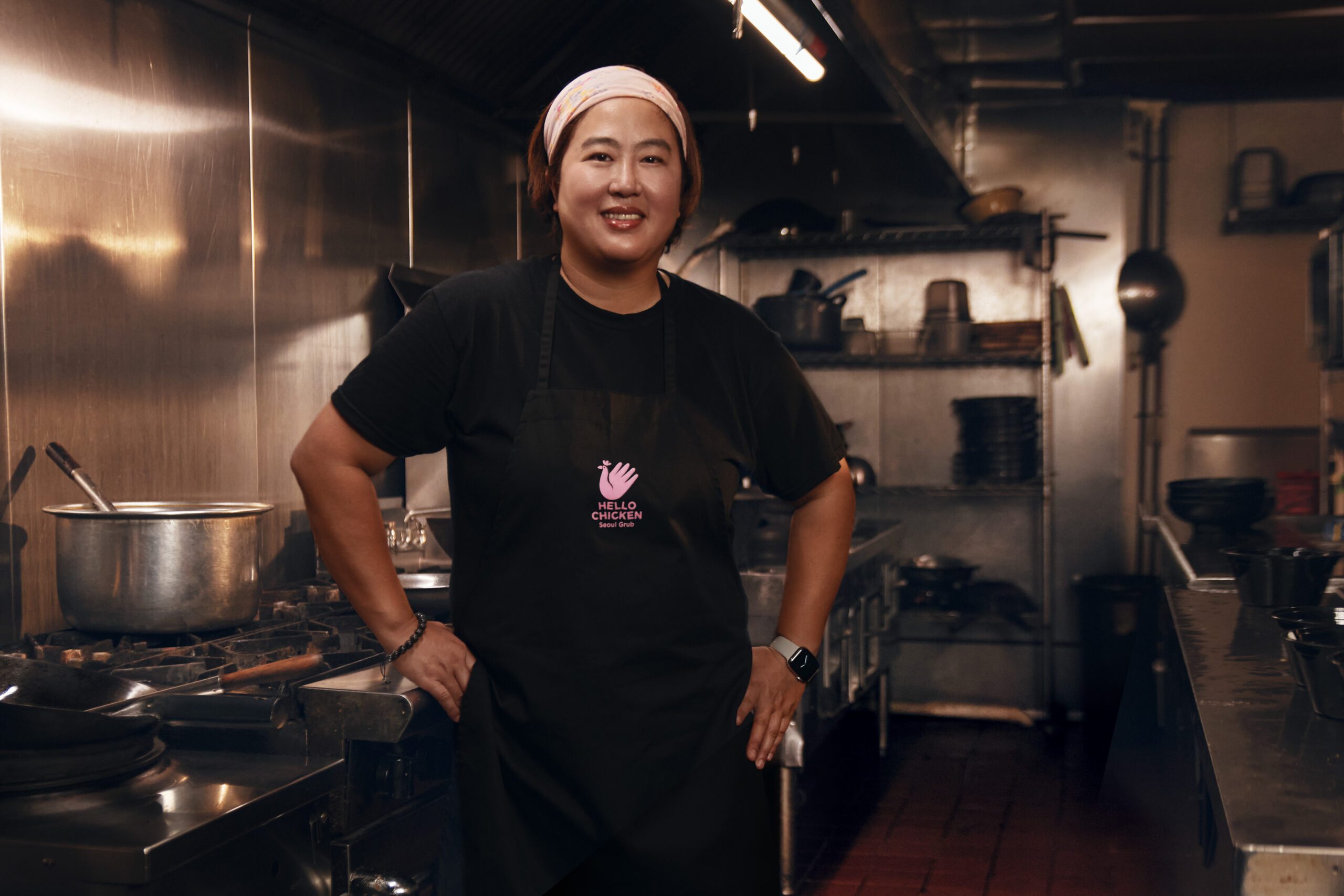 A Comcast RISE participant standing in a professional kitchen.