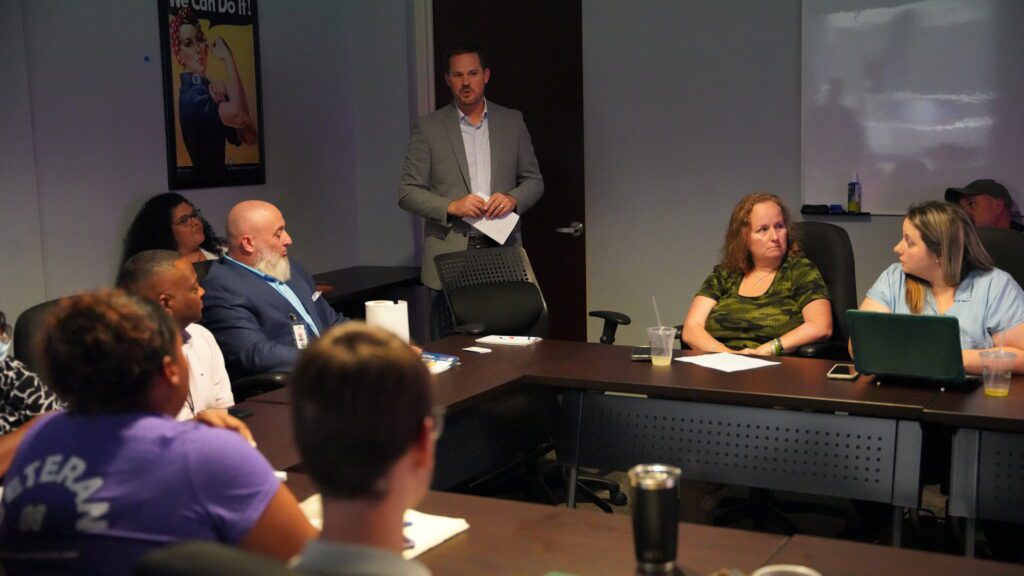 Demian Voiles speaking to Combined Arms Committee members