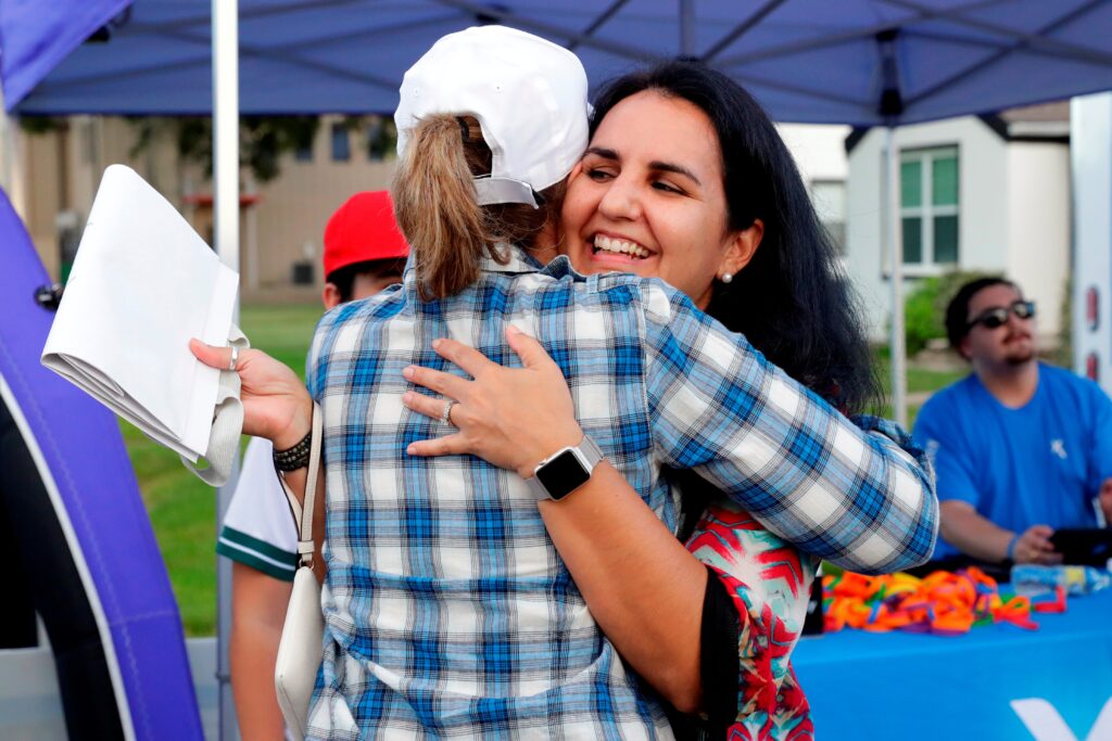 Two women hugging