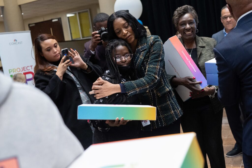 Young girl receiving a hug