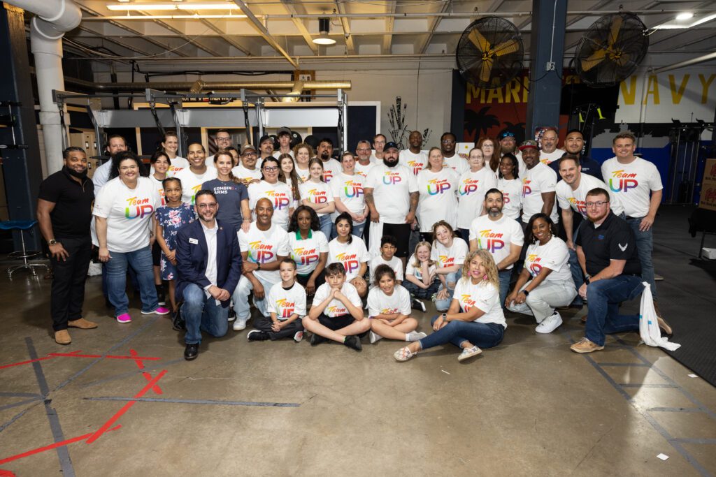 Large group of Team Up volunteers posing for a group picture