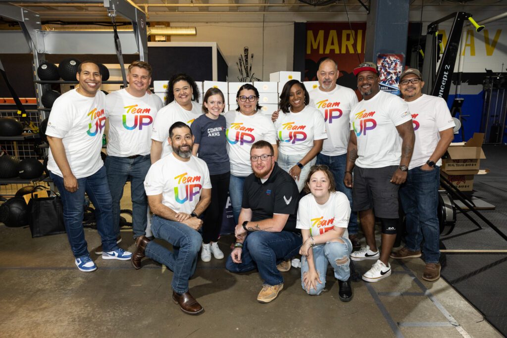 A group of Team Up volunteers posing for a picture