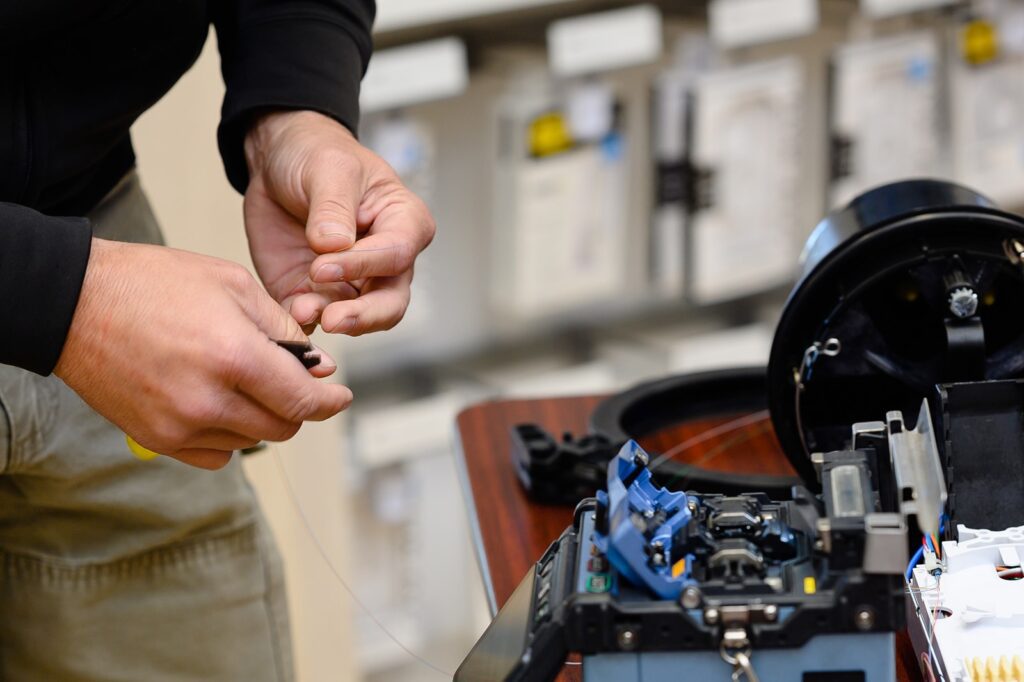 Close up on the hands of a technician.