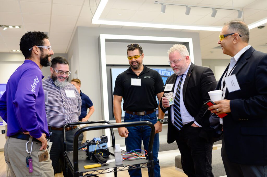 Xfinity techs, Comcast rep and elected officials discuss fiber