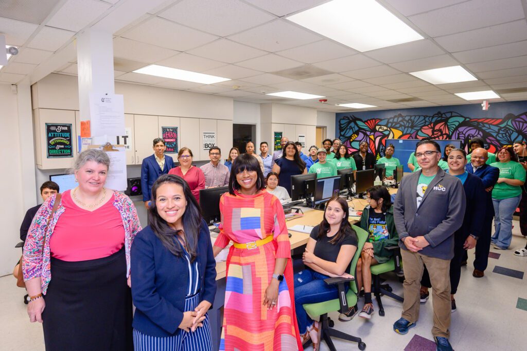 Attendees of the Work and Learn Center's Open House gather for a photo.