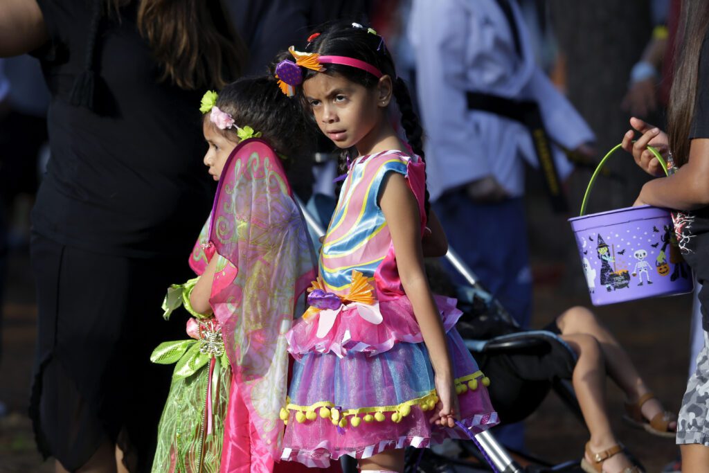 Attendees enjoy the festivities during the Comcast Kingwood Takeover, held at the Kingwood Town Center Park on Saturday, Oct. 28, 2023 in Kingwood, TX. (Michael Wyke/AP Images for Comcast)