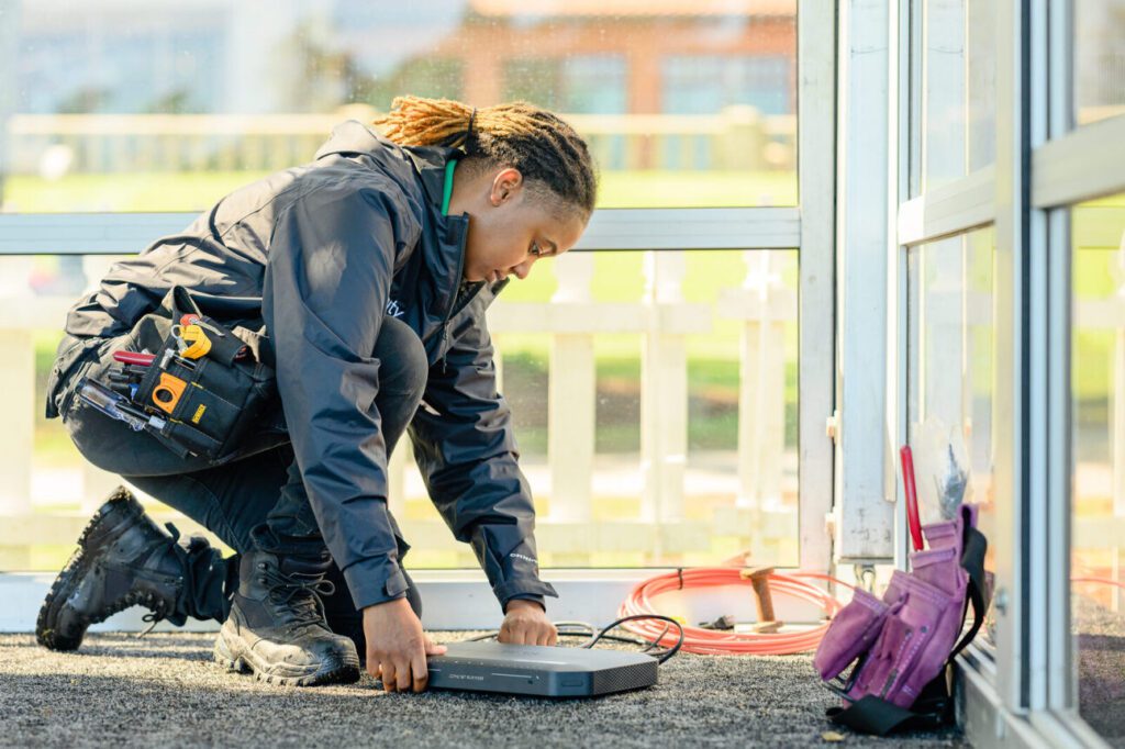 An Xfinity technician installs service.